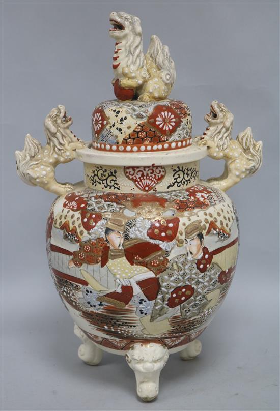 A Japanese Satsuma koro, the domed cover with shishi finial, decorated with figures, H.15.25in (38.75cm)